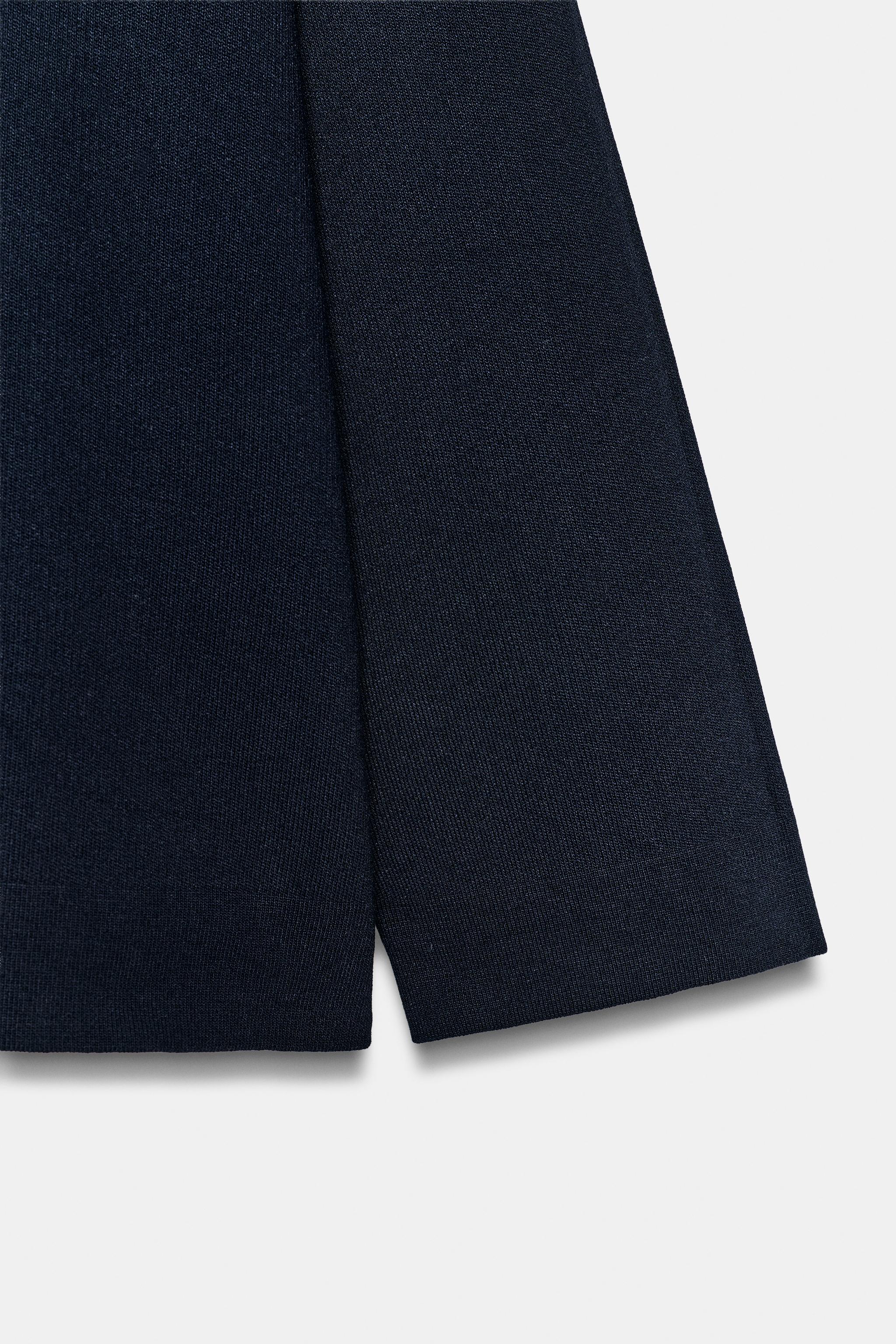 PULL EN MAILLE À COL MONTANT